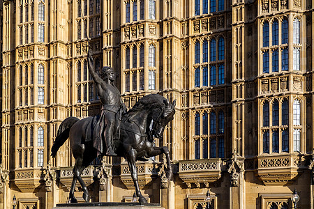 在议会众议院外建筑学旗帜金子历史国王联盟吸引力晴天房屋雕像图片