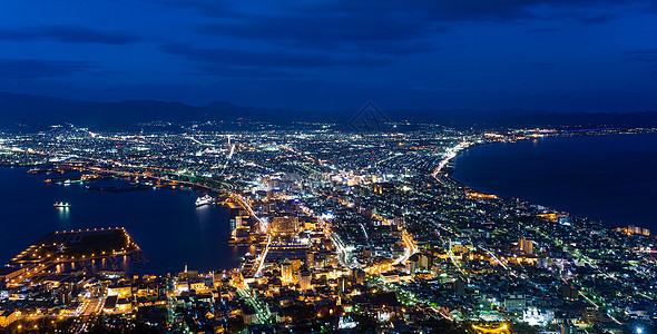 日本哈科达特市公吨天空季节紫色城市海洋码头游客风景场景图片