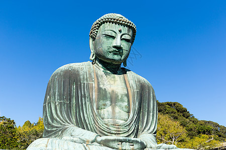 光阴晴朗的蓝天 在卡马库拉的佛像中历史性青铜蓝色崇拜雕塑大佛天空观光宗教旅行图片