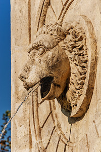 雕塑墙不喷泉古董艺术蓝天建筑学狮子动物风格旅行纪念碑雕塑背景