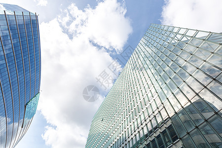 现代建筑商业高楼建筑物蓝色摩天大楼反射城市办公室公司高科技图片