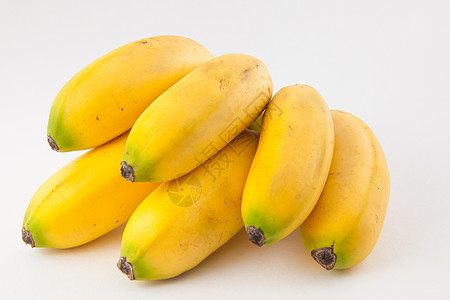 小型香蕉 在白面包上称为杂草芭蕉饮食甜点维生素果汁白色热带黄色水果图片
