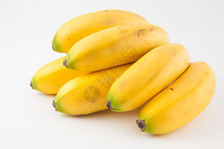 小型香蕉 在白面包上称为杂草果汁饮食黄色维生素水果芭蕉热带白色甜点图片