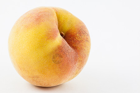 Peach 以白色背景隔离天鹅绒水果圆形工作室蔬菜食物维生素营养黄色红色图片