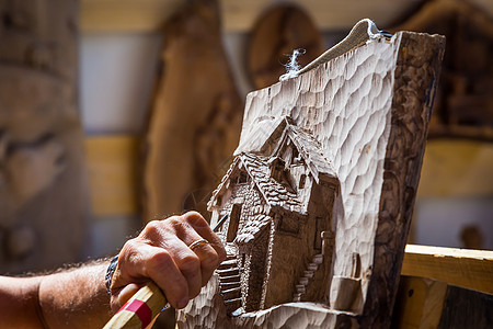 活木雕刻手雕塑家工作室项目乐器精神手指爱好工作创造者工匠图片