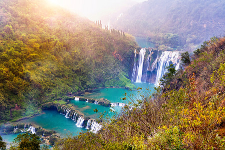 中国卢平的久龙瀑布蓝色流动溪流旅游旅行海岸世界游客公园天空图片