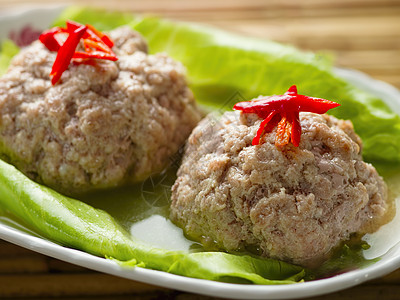 中国人蒸狮子头猪肉球狮子猪肉红色水平肉丸食物烹饪背景图片