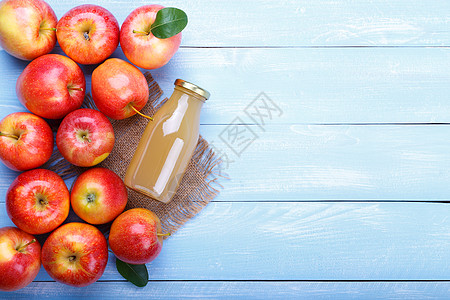 鲜榨橙汁苹果汁加肉桂食物花园饮食水果木板木头农业市场果汁季节背景