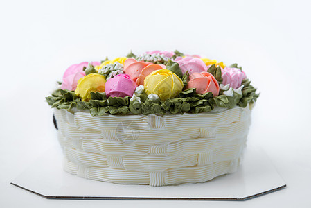 带鲜花的生日蛋糕粉色庆典甜点花朵奶油糕点蛋糕食物派对装饰图片
