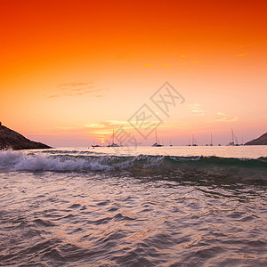 日落 天空飞亮风景蓝色海洋海景海浪热带场景假期旅行橙子图片