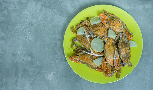 蒸螃蟹海鲜动物红色甲壳美食午餐盘子食物贝类橙子背景图片