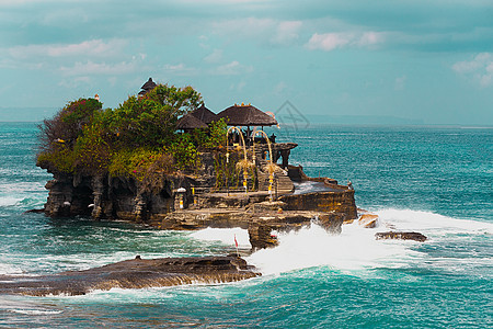 印度尼西亚巴厘岛海边宗教传统崇拜海浪历史情调日落异国地标石头图片
