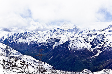 高加索山脉在寒风雪下荒野季节爬坡高度天空悬崖冻结风景冰川全景图片