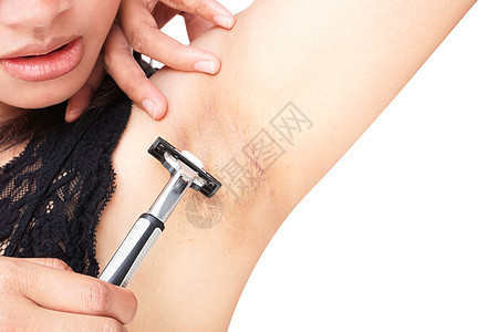 女人用剃刀刮白色背面的剃胡须剃须女性治疗肤色女孩头发皮肤卫生护理腋窝图片