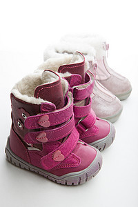 婴儿冬季鞋子演播室质量白背景靴子衣服女孩皮革蕾丝孩子们孩子鞋类羊皮女性图片