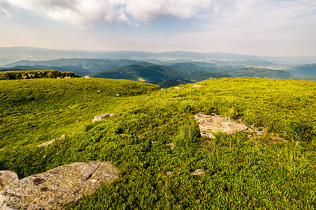 在山顶的草原上空地草甸子地面爬坡山坡床单边缘土地丘陵地毯图片