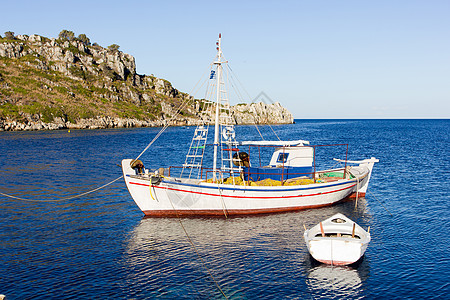 希腊赞特岛的地貌景观天空树木渔船支撑港口图标胜地目的地爬坡悬崖图片