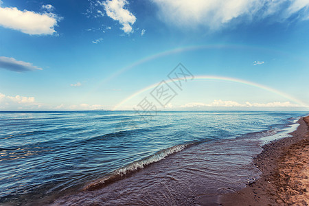 美丽的彩虹滤镜支撑海滩颜色模拟大自然太阳天空胶片图片