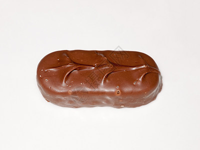 白面糖食品上的棕色巧克力奖彩条坚果焦糖牛奶美食食物可可热带赏金乐趣手指背景图片