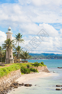 阳光下的建筑斯里兰卡加勒(Galle)-参观旧灯塔附近的海滩背景