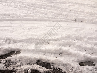 地上积雪的全表面和足迹纹理地面季节水晶雪花墙纸阴影大雪雪堆冻结天气图片