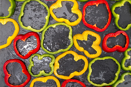 岩片漆彩色切片飞沫蔬菜红色食物平板黄色片岩绿色团体胡椒背景