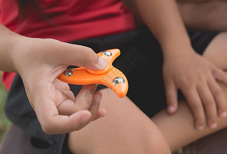 孩子们玩手指脊椎小器 Populan 脊椎设备粉色塑料压力滚筒绿色活力童年男人乐趣玩具图片