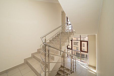 有楼梯的大厅玻璃入口公司栏杆窗户人行道建筑学建筑城市金属图片