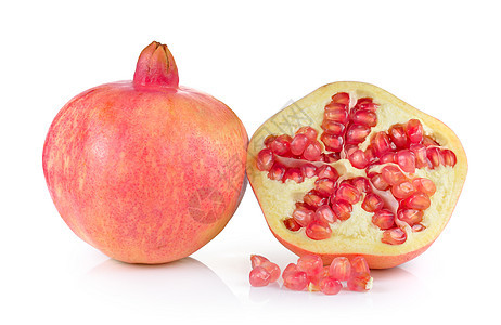 白色背景上的石榴甜点饮食热带种子红色水果食物图片