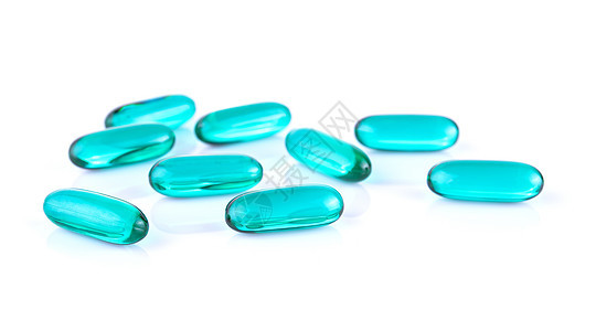 蓝色透明药丸内含药品胶囊 白色反面医疗饮食药店制药关心疾病宏观治愈凝胶维生素图片