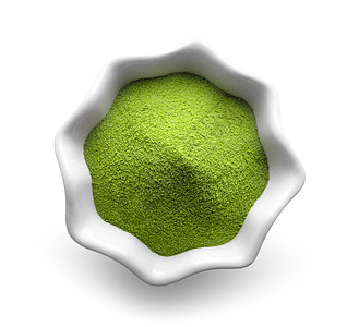 白色背景的碗中的绿茶粉粉末食物草本饮料仪式粉状抹茶健康文化图片