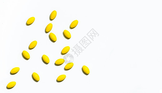 白色背景的黄色椭圆形药丸 具有美丽的创意图案和文本复制空间 轻度至中度疼痛管理 止痛药卫生药品药物药店抗炎保健牙疼制造业治疗偏头图片