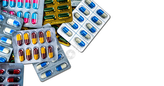 五颜六色的抗生素胶囊药丸在白色背景与空间隔离的泡罩包装中 感染性疾病药 抗生素用药合理搭配 抗药性保健理念图片