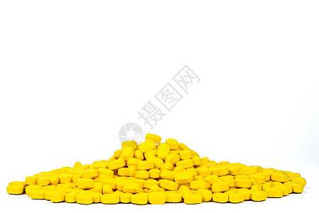 一堆黄色卵形矩形药丸 在白色背景上与复制空间隔离 缓解疼痛和偏头痛的药物 医药行业 全球医疗保健概念图片