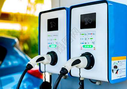 电动汽车充电站 用于带电动机的车辆的插头 投币式充电站 清洁能源动力 商业充电站 充电点 基础设施政策工程技术力量蓝色充值电池引图片
