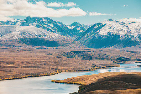 来自新西兰约翰山的Tekapo湖视图风景旅游反射绿色爬坡天空旅行粉色蓝色季节图片