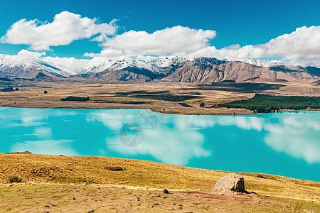 来自新西兰约翰山的Tekapo湖视图天空反射粉色风景旅行蓝色季节公吨绿色旅游图片