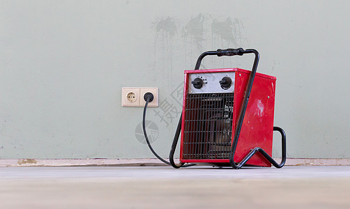 红装红色暖热器 烘干地板工作加热器插头加热袖珍管道房子服务力量地面图片