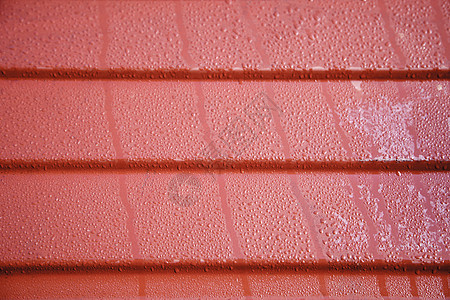 湿表面浮雕时间管道雨滴外套窗户汽车红色潮湿金属图片