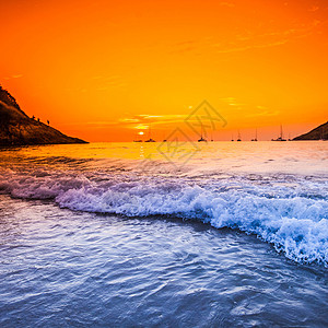 日落 天空飞亮风景海洋蓝色冲浪游艇场景戏剧性橙子海景假期图片