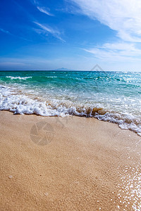 沙沙滩上的海浪海洋海岸天空海岸线波纹流动蓝色冲浪海滨热带图片