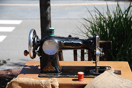 旧缝纫机职业缝纫古董工艺品木头机器工作工艺手工黑色图片