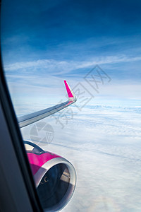 飞机窗口视图窗户旅游气氛运输航班太阳日落航空土地天空假期高清图片素材