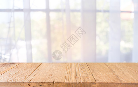 空木制桌 在抽象模糊的CO背景前桌子商业木板木头咖啡店柜台展示产品餐厅厨房图片