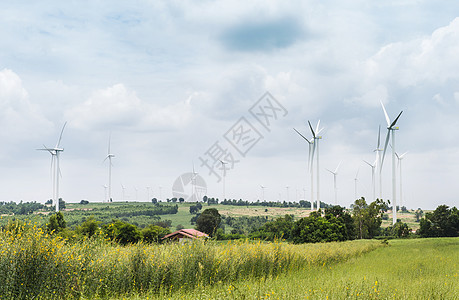 风风涡轮发电机在农场地貌中占据一席之地环境白色活力涡轮机季节螺旋桨绿色旋转力量桅杆图片