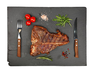 黑板上特写门房牛肉牛排美食肋骨石板尺寸骨头烹饪牛肉烧烤木板厨房图片