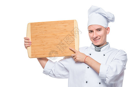 一位经验丰富的厨师的横向肖像和切割板图片