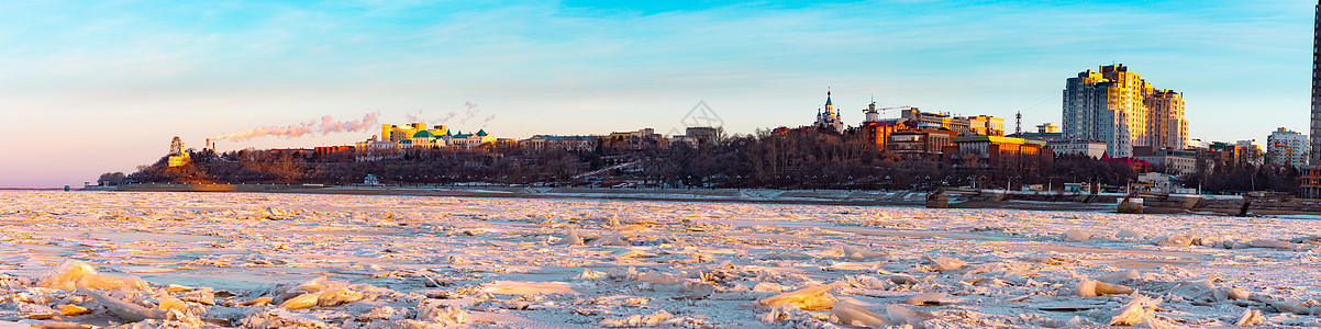 黎明时分从阿穆尔河看哈巴罗夫斯克市 冷冻河 工业景色建筑学季节晴天文化蓝色景观栅栏天气房子旅行图片