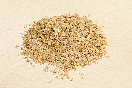 白色背景上未熟熟的燕麦片片纤维收成植物小吃碎粒麦片粮食燕麦食物农业图片