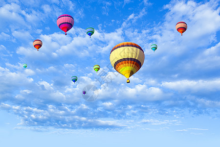 热气球在天空中飞翔气球白色节日太阳乐趣自由绿色冒险蓝色图片